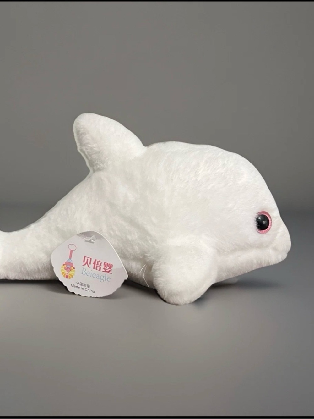 White Plush Dolphin Toy with Pink-Trimmed Eyes